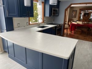 Solid surface kitchen countertop installed by Pine Hill Fabricators